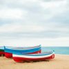 Row Of Wood Boats On Beach paint by number